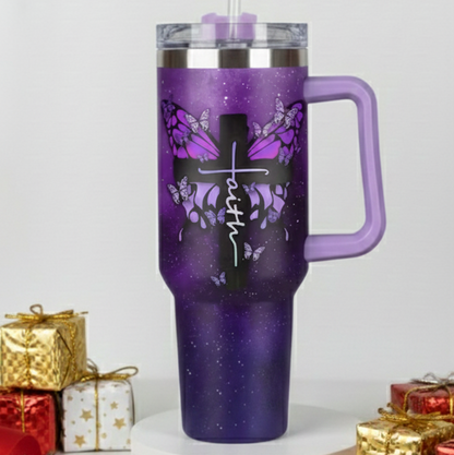 Purple insulated mug with butterfly design and 'faith' text, surrounded by small gift boxes.